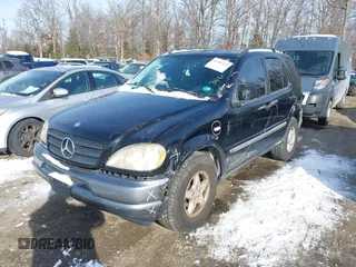 1998 Mercedes-Benz M-Class with VIN 4JGAB54E5WA041689, listed as a IAAI auction lot 41302422 with 207,103 mi miles. Bid and sale history available at carsss.com. Image 2.