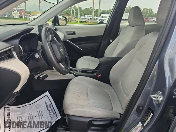 2022 Toyota Corolla Cross L with VIN 7MUAAAAG8NV017626, listed as a IAAI auction lot 42566409 with 49,073 mi miles and . Bid and sale history available at DreamBid. Image 3.