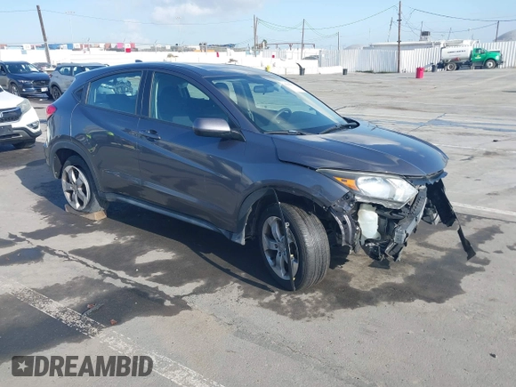 2018 Honda HR-V LX with VIN 3CZRU6H35JG719653, listed as a IAAI auction lot 41956051 with 74,307 mi miles. Bid and sale history available at carsss.com. Image 1.