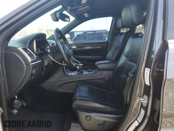 2015 Jeep Grand Cherokee Overland with VIN 1C4RJFCMXFC237723, listed as a Copart auction lot 50318145 with 103,741 mi miles and Salvage title. Bid and sale history available at DreamBid. Image 7.