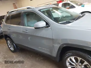 2021 Jeep Cherokee Latitude Lux with VIN 1C4PJMMX0MD214608, listed as a IAAI auction lot 41452997 with 31,441 mi miles and . Bid and sale history available at DreamBid. Image 13.