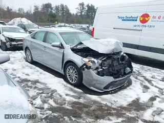 2016 Toyota Avalon Hybrid XLE Premium with VIN 4T1BD1EB0GU049999, listed as a IAAI auction lot 41624589 with 61,785 mi miles. Bid and sale history available at carsss.com. Image 1.