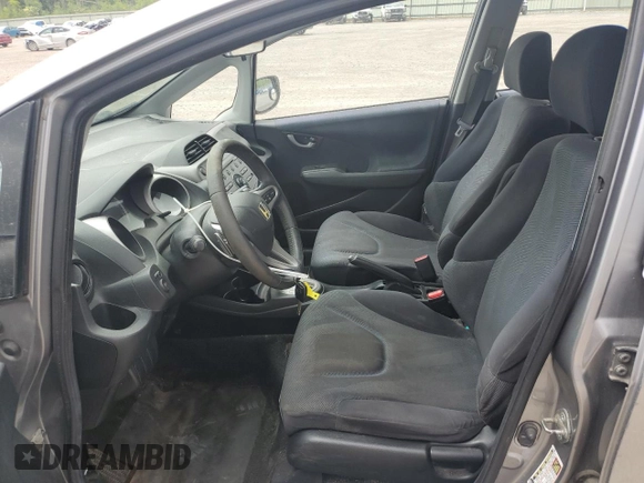 2009 Honda Fit Sport with VIN JHMGE88469S064405, listed as a Copart auction lot 61413745 with 179,497 mi miles and Salvage title. Bid and sale history available at DreamBid. Image 7.