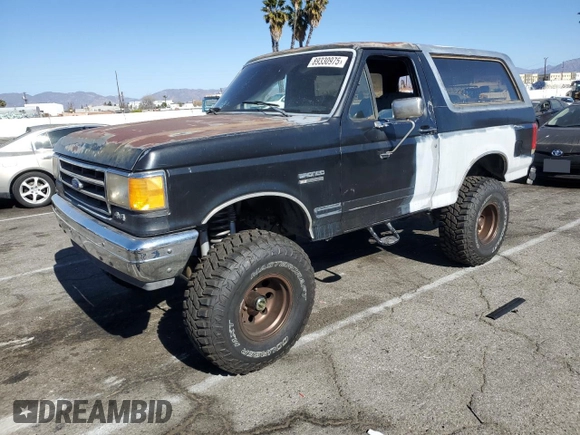 1989 Ford Bronco Custom with VIN 1FMEU15H1KLA71087, listed as a Copart auction lot 89330975 with 98,096 mi miles and Salvage Title. Bid and sale history available at DreamBid. Image 1.