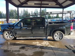 2012 GMC Sierra 1500 SLT with VIN 3GTP2WE75CG289247, listed as a IAAI auction lot 41871709 with 153,177 mi miles and . Bid and sale history available at DreamBid. Image 14.