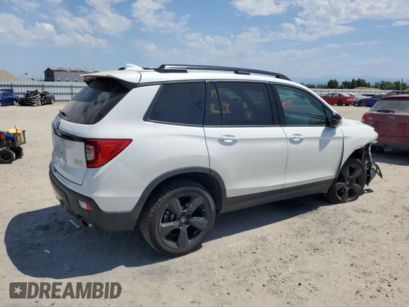 2021 Honda Passport Elite with VIN 5FNYF8H03MB007617, listed as a Copart auction lot 63036345 with 21,757 mi miles and Salvage title. Bid and sale history available at DreamBid. Image 3.