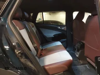 2023 Volkswagen ID.4 Pro z VIN 1V2DNPE84PC038042, wystawiony jako IAAI lot #41446269 z przebiegiem 12 878 mil mil oraz . Historia ofert i sprzedaży dostępna na DreamBid. Obrazek 8.