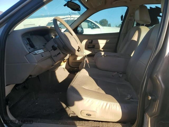 2005 Ford Crown Victoria LX with VIN 2FAFP74W75X129929, listed as a Copart auction lot 89020125 with 156,115 mi miles and Salvage Title. Bid and sale history available at carsss.com. Image 7.
