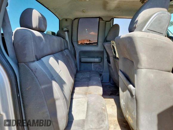 2006 Ford F-150 XL with VIN 1FTPX12V16NB79069, listed as a Copart auction lot 62731485 with 215,056 mi miles and Salvage title. Bid and sale history available at DreamBid. Image 10.