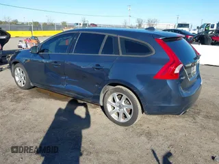 2015 Volvo V60 T5 Drive-E with VIN YV140MEJ8F1261268, listed as a IAAI auction lot 41517740 with 112,991 mi miles. Bid and sale history available at carsss.com. Image 3.