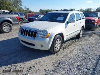 2009 Jeep Grand Cherokee Limited with VIN 1J8HR58P89C513900, listed as a IAAI auction lot 41615957 with 152,119 mi miles. Bid and sale history available at carsss.com. Image 2.
