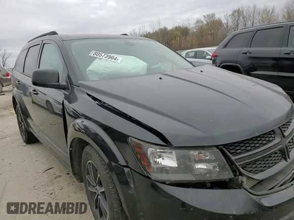 2019 Dodge Journey SE z VIN 3C4PDCBB1KT719203, wystawiony jako Copart lot #86170744 z przebiegiem Nie podano mil oraz Szkoda całkowita • Salvage title. Historia ofert i sprzedaży dostępna na DreamBid. Obrazek 10.