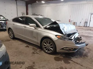2017 Ford Fusion Energi SE with VIN 3FA6P0PU8HR270304, listed as a IAAI auction lot 41319303 with 141,103 mi miles. Bid and sale history available at carsss.com. Image 1.