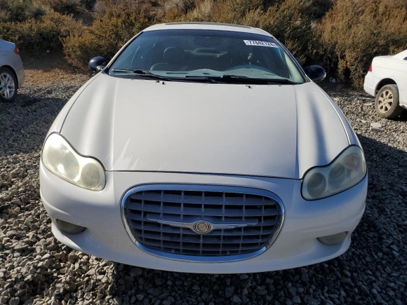 2001 Chrysler LHS z VIN 2C3AC56GX1H547856, wystawiony jako Copart lot #77842124 z przebiegiem 97 378 mil mil oraz Tytuł czysty. Historia ofert i sprzedaży dostępna na DreamBid. Obrazek 5.