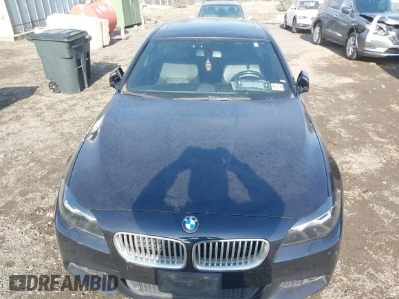 2013 BMW 5 Series 550i xDrive with VIN WBAFU9C52DDY70807, listed as a IAAI auction lot 41663855 with 92,009 mi miles and . Bid and sale history available at carsss.com. Image 6.