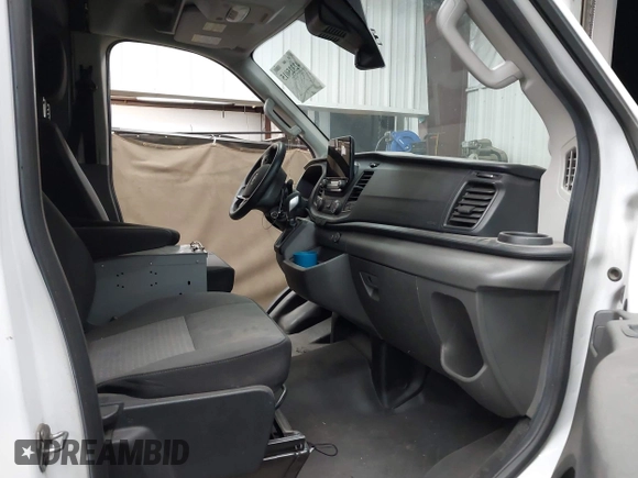 2020 Ford Transit Cargo with VIN 1FTBR1CG8LKB66921, listed as a IAAI auction lot 42325015 with Not provided miles and . Bid and sale history available at DreamBid. Image 5.