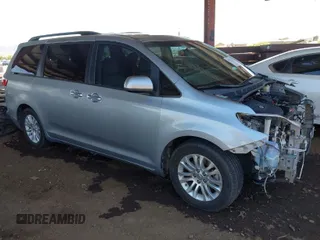 2016 Toyota Sienna XLE with VIN 5TDYK3DCXGS751231, listed as a IAAI auction lot 41975167 with 135,266 mi miles. Bid and sale history available at carsss.com. Image 1.