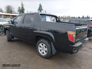 2006 Honda Ridgeline RTL with VIN 2HJYK16596H530876, listed as a IAAI auction lot 41906807 with 1 mi miles. Bid and sale history available at carsss.com. Image 3.