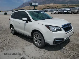 2018 Subaru Forester Touring with VIN JF2SJAWC4JH435749, listed as a Copart auction lot 63526465 with 143,029 mi miles and Salvage title. Bid and sale history available at DreamBid. Image 4.