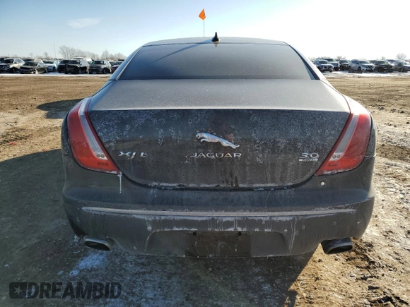 2014 Jaguar XJ Portfolio with VIN SAJWJ2GD6E8V73491, listed as a Copart auction lot 42472345 with 68,747 mi miles and Salvage title. Bid and sale history available at DreamBid. Image 6.