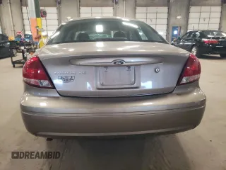 2005 Ford Taurus SE with VIN 1FAFP53U15A276082, listed as a Copart auction lot 52015285 with 103,479 mi miles and Salvage Title. Bid and sale history available at carsss.com. Image 6.