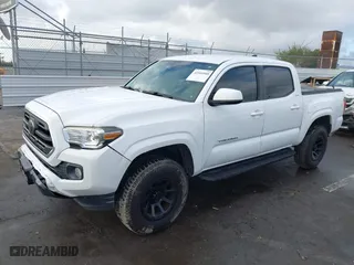 2019 Toyota Tacoma 2WD SR with VIN 5TFAX5GN0KX141367, listed as a IAAI auction lot 41544948 with 92,302 mi miles. Bid and sale history available at carsss.com. Image 18.