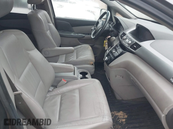 2011 Honda Odyssey EX-L with VIN 5FNRL5H66BB103352, listed as a IAAI auction lot 41901832 with 238,727 mi miles and . Bid and sale history available at carsss.com. Image 5.