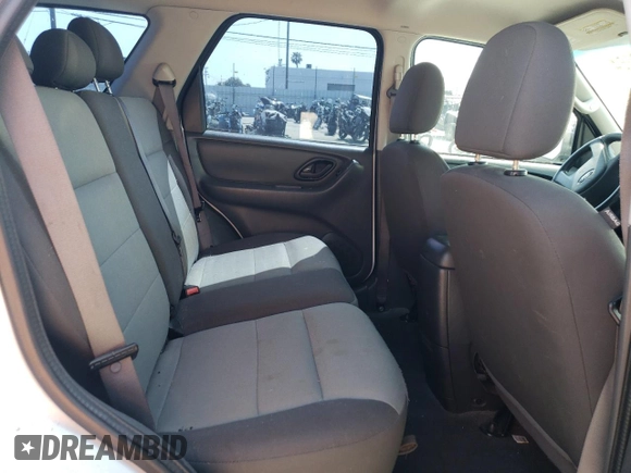 2006 Ford Escape XLS with VIN 1FMCU02Z36KA71926, listed as a Copart auction lot 57697364 with 225,212 mi miles and Salvage title. Bid and sale history available at DreamBid. Image 11.