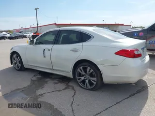 2013 Infiniti M with VIN JN1BY1AP4DM511067, listed as a IAAI auction lot 41890196 with 316,837 mi miles and . Bid and sale history available at DreamBid. Image 14.