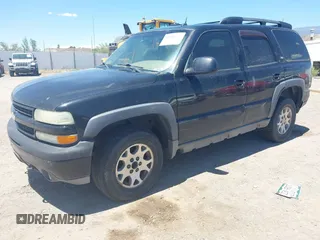 2005 Chevrolet Tahoe LT z VIN 1GNEK13T35R116833, wystawiony jako IAAI lot #42508302 z przebiegiem 254 759 mil mil oraz . Historia ofert i sprzedaży dostępna na DreamBid. Obrazek 2.