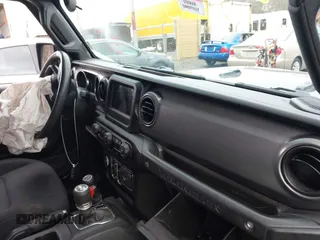 2023 Jeep Wrangler Sport with VIN 1C4HJXDN5PW522855, listed as a IAAI auction lot 41516522 with 49,607 mi miles and . Bid and sale history available at DreamBid. Image 5.