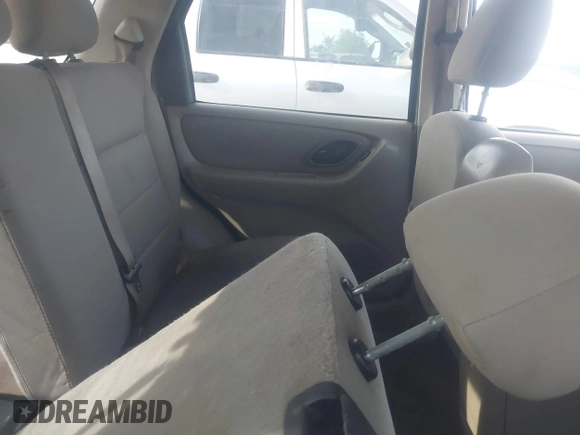 2005 Ford Escape XLT with VIN 1FMYU03145KA40360, listed as a IAAI auction lot 42511276 with 151,269 mi miles and . Bid and sale history available at DreamBid. Image 8.