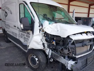 2021 Ford Transit Cargo with VIN 1FTBR1C86MKA10399, listed as a IAAI auction lot 42074285 with 55,572 mi miles and . Bid and sale history available at DreamBid. Image 6.