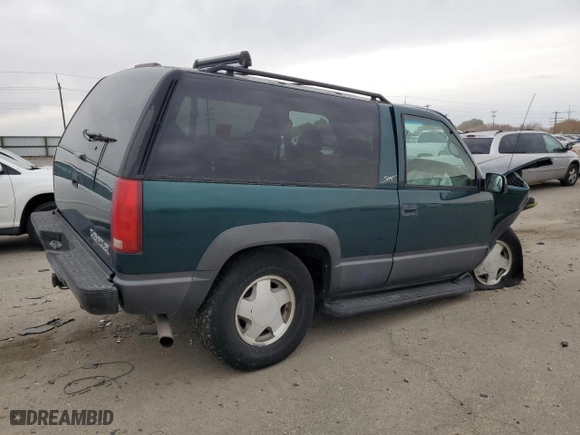 1998 Chevrolet Tahoe with VIN 3GNEK18R4WG128424, listed as a Copart auction lot 79684984 with 217,456 mi miles and Salvage Title. Bid and sale history available at carsss.com. Image 3.