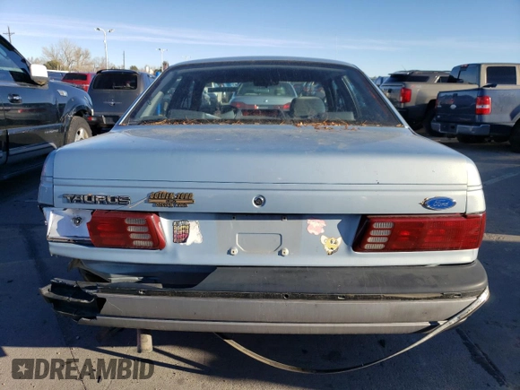 1991 Ford Taurus z VIN 1FACP52U3MA237495, wystawiony jako Copart lot #82519194 z przebiegiem 41 048 mil mil oraz Czysty tytuł • Clean title. Historia ofert i sprzedaży dostępna na DreamBid. Obrazek 6.