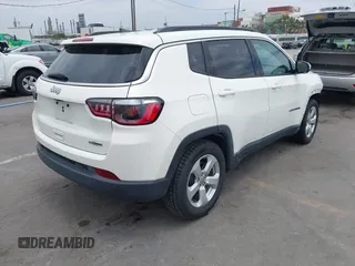 2021 Jeep Compass Latitude with VIN 3C4NJCBB6MT538682, listed as a IAAI auction lot 42442459 with 59,163 mi miles and . Bid and sale history available at DreamBid. Image 4.