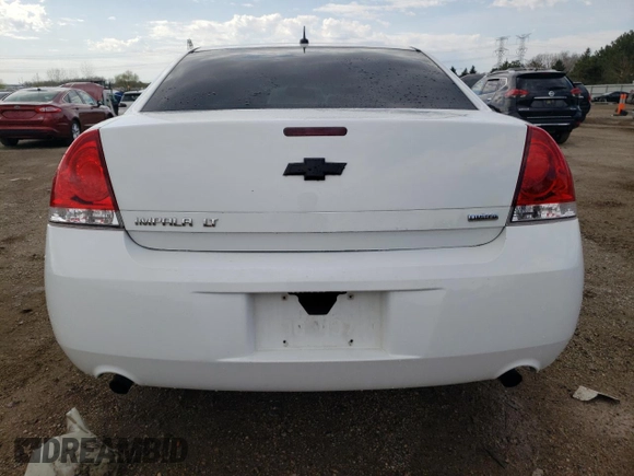 2014 Chevrolet Impala LT with VIN 2G1WB5E31E1154130, listed as a Copart auction lot 54212785 with 150,169 mi miles and Salvage title. Bid and sale history available at DreamBid. Image 6.