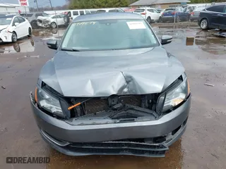 2013 Volkswagen Passat SE w/Sunroof with VIN 1VWBH7A38DC002096, listed as a IAAI auction lot 41904594 with 134,738 mi miles. Bid and sale history available at carsss.com. Image 13.
