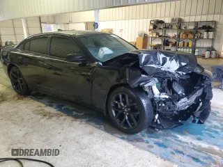 2023 Dodge Charger SXT z VIN 2C3CDXBG7PH534675, wystawiony jako Copart lot #44913145 z przebiegiem 58 106 mil mil oraz Szkody całkowita. Historia ofert i sprzedaży dostępna na DreamBid. Obrazek 4.