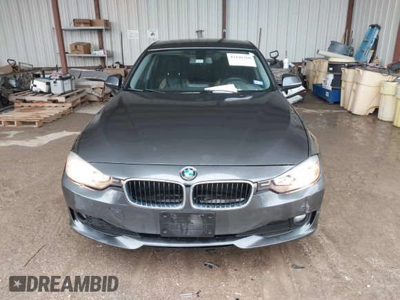 2014 BMW 3 Series 320i xDrive with VIN WBA3C3G5XENS67385, listed as a IAAI auction lot 42148360 with 98,216 mi miles and . Bid and sale history available at DreamBid. Image 12.