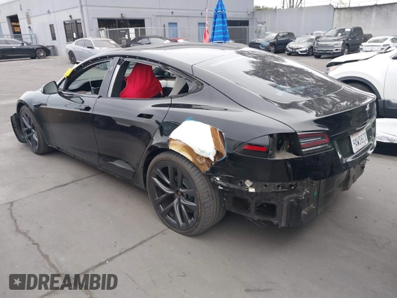 2022 Tesla Model S with VIN 5YJSA1E55NF474342, listed as a IAAI auction lot 41870994 with 33,804 mi miles and . Bid and sale history available at DreamBid. Image 3.