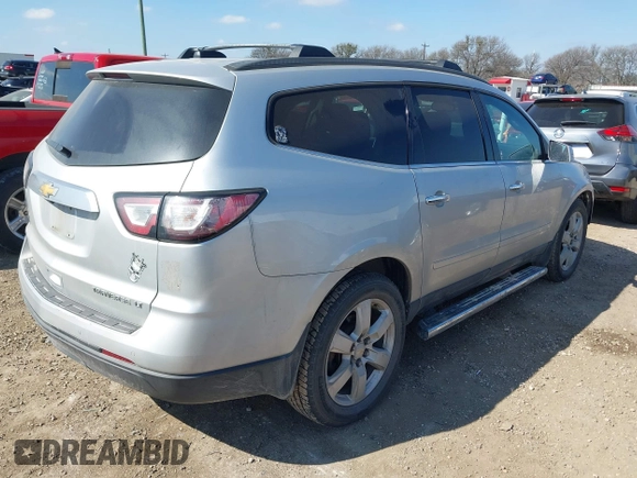 2016 Chevrolet Traverse LT with VIN 1GNKRGKD3GJ176589, listed as a IAAI auction lot 41489907 with 195,141 mi miles. Bid and sale history available at carsss.com. Image 4.
