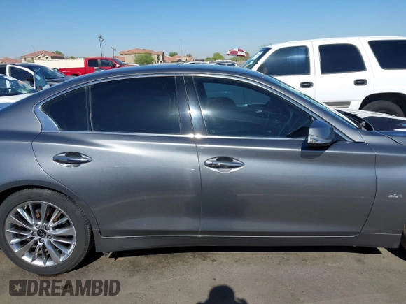 2017 Infiniti Q50 Premium z VIN JN1EV7AP5HM733602, wystawiony jako IAAI lot #42334405 z przebiegiem 174 058 mil mil oraz . Historia ofert i sprzedaży dostępna na DreamBid. Obrazek 13.