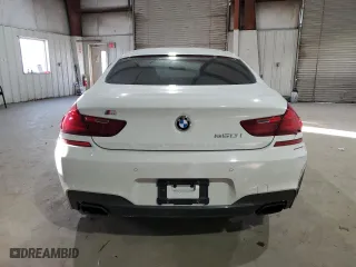 2015 BMW 6 Series 650i xDrive with VIN WBA6B4C56FD761374, listed as a Copart auction lot 41599334 with 63,057 mi miles and Salvage Title. Bid and sale history available at carsss.com. Image 6.