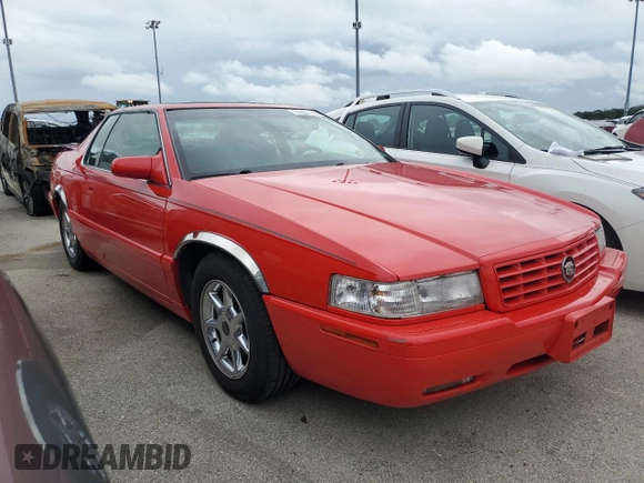 2002 Cadillac Eldorado z VIN 1G6EC129X2B106142, wystawiony jako Copart lot #74424164 z przebiegiem Nie podano mil oraz Szkoda całkowita • Salvage title. Historia ofert i sprzedaży dostępna na DreamBid. Obrazek 4.