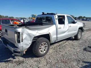 2017 GMC Sierra 1500 SLE with VIN 3GTU2MEC3HG199980, listed as a IAAI auction lot 40534708 with 129,765 mi miles and . Bid and sale history available at DreamBid. Image 4.