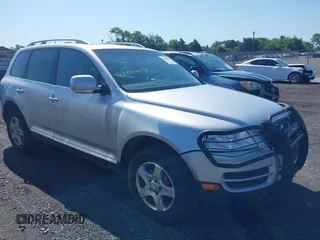 2007 Volkswagen Touareg V6 with VIN WVGZE77L47D009090, listed as a IAAI auction lot 42544507 with 299,680 mi miles and . Bid and sale history available at DreamBid. Image 1.