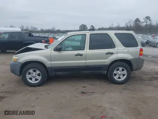 2005 Ford Escape XLT with VIN 1FMYU93135DA07844, listed as a IAAI auction lot 41786019 with 118,840 mi miles. Bid and sale history available at carsss.com. Image 14.