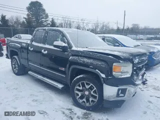 2014 GMC Sierra 1500 SLT with VIN 1GTV2VECXEZ100108, listed as a IAAI auction lot 41589773 with 203,471 mi miles. Bid and sale history available at carsss.com. Image 1.