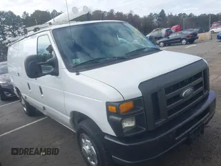 2012 Ford Econoline Cargo Commercial with VIN 1FTNE1EWXCDB38975, listed as a IAAI auction lot 41747167 with 331,484 mi miles. Bid and sale history available at carsss.com. Image 1.